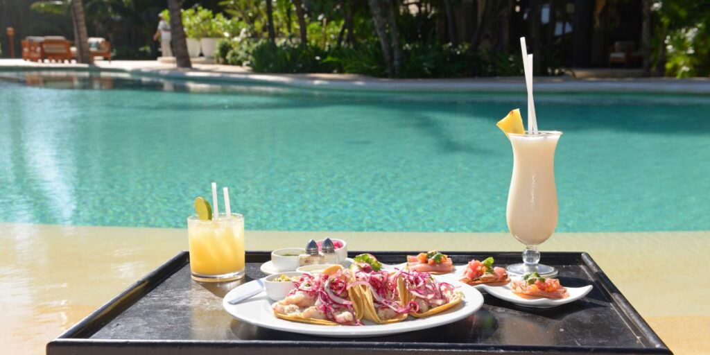 Plated Tacos by the pool with frozen cocktail drinks